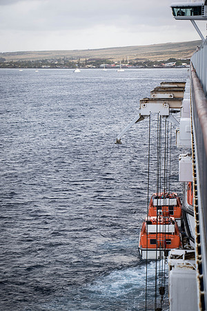 Putting the tenders into the water.